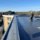 Professional flat roof installation with precise flat roof detail for commercial properties.