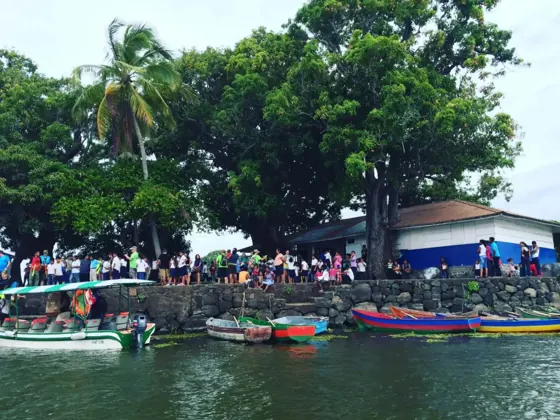 A community gathering near the water.