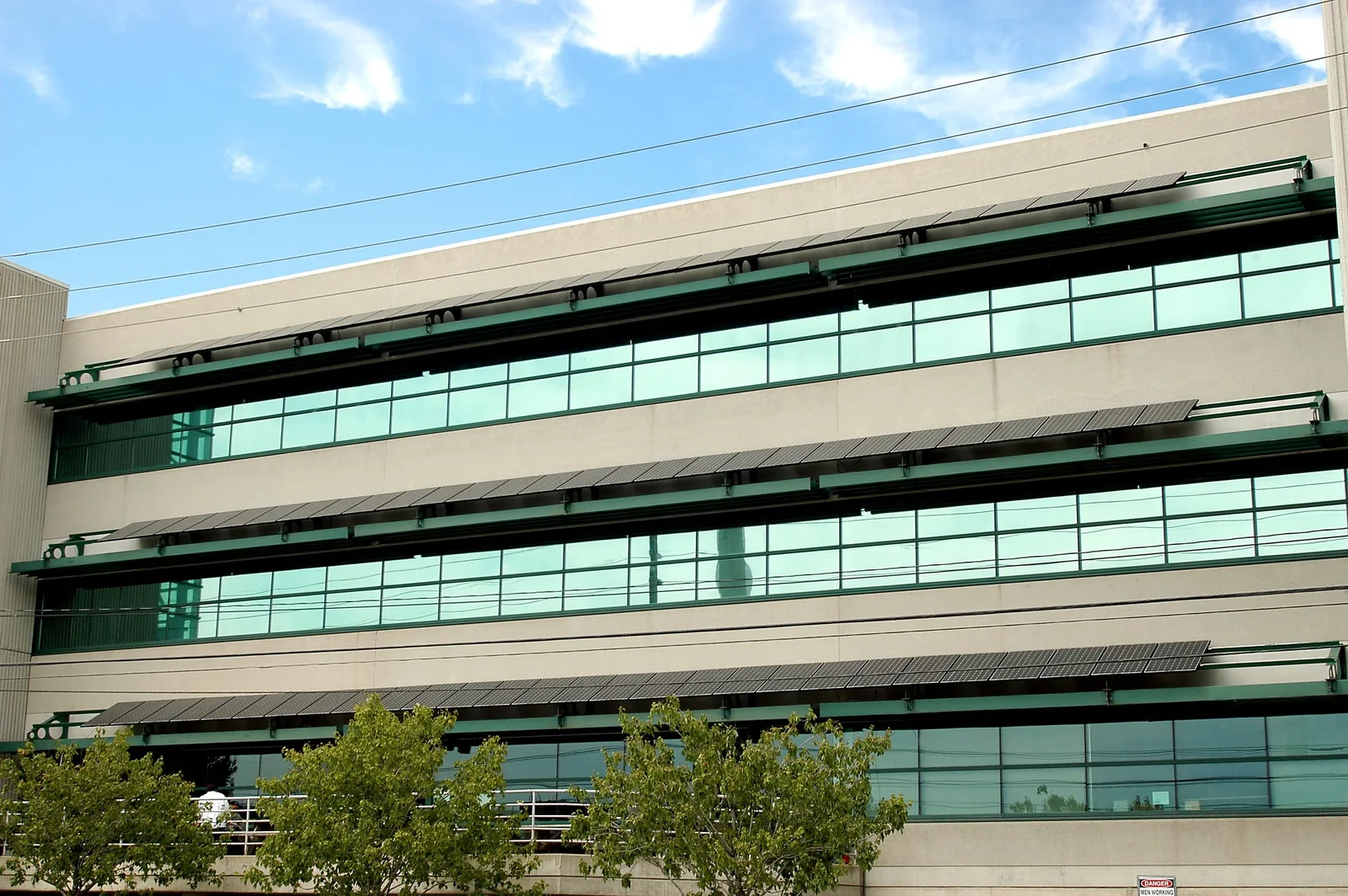 Photovoltaic facade elements integrated with a commercial building exterior