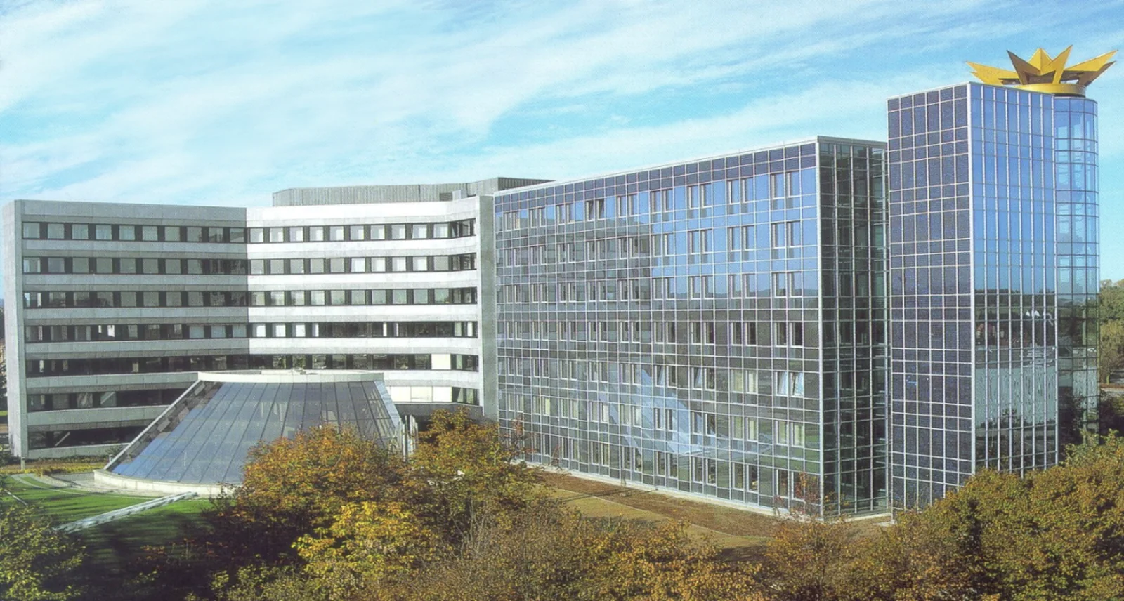 Photovoltaic facade and glazing elements on a multi-storey institutional building