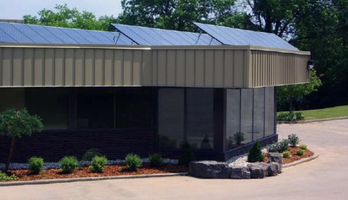 Solar modules mounted on the roof of a small commercial facility
